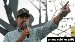 El presidente venezolano Nicolás Maduro en un acto del Partido Socialista Unido, en Caracas, en septiembre pasado. (AP Foto/Ariana Cubillos)